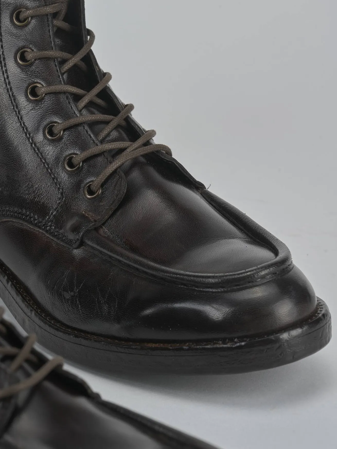 Anfibi tacco 1cm pelle testa