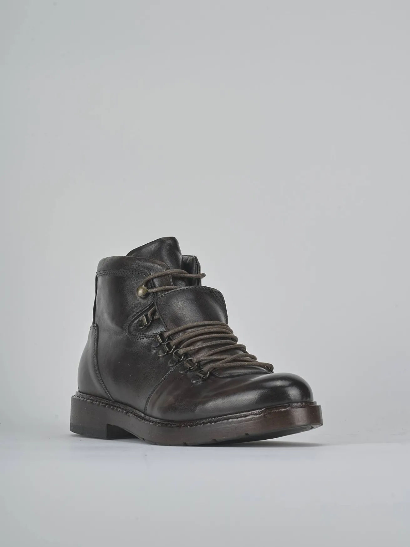 Anfibi tacco 1cm pelle testa