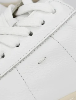 sneakers fondo gomma e soletto interno in vera pelle. tomaia in morbida pelle bianco