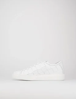 sneakers fondo gomma e soletto interno in vera pelle. tomaia in morbida pelle intrecciata bianco