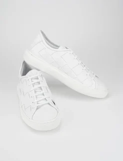 sneakers fondo gomma e soletto interno in vera pelle. tomaia in morbida pelle intrecciata bianco