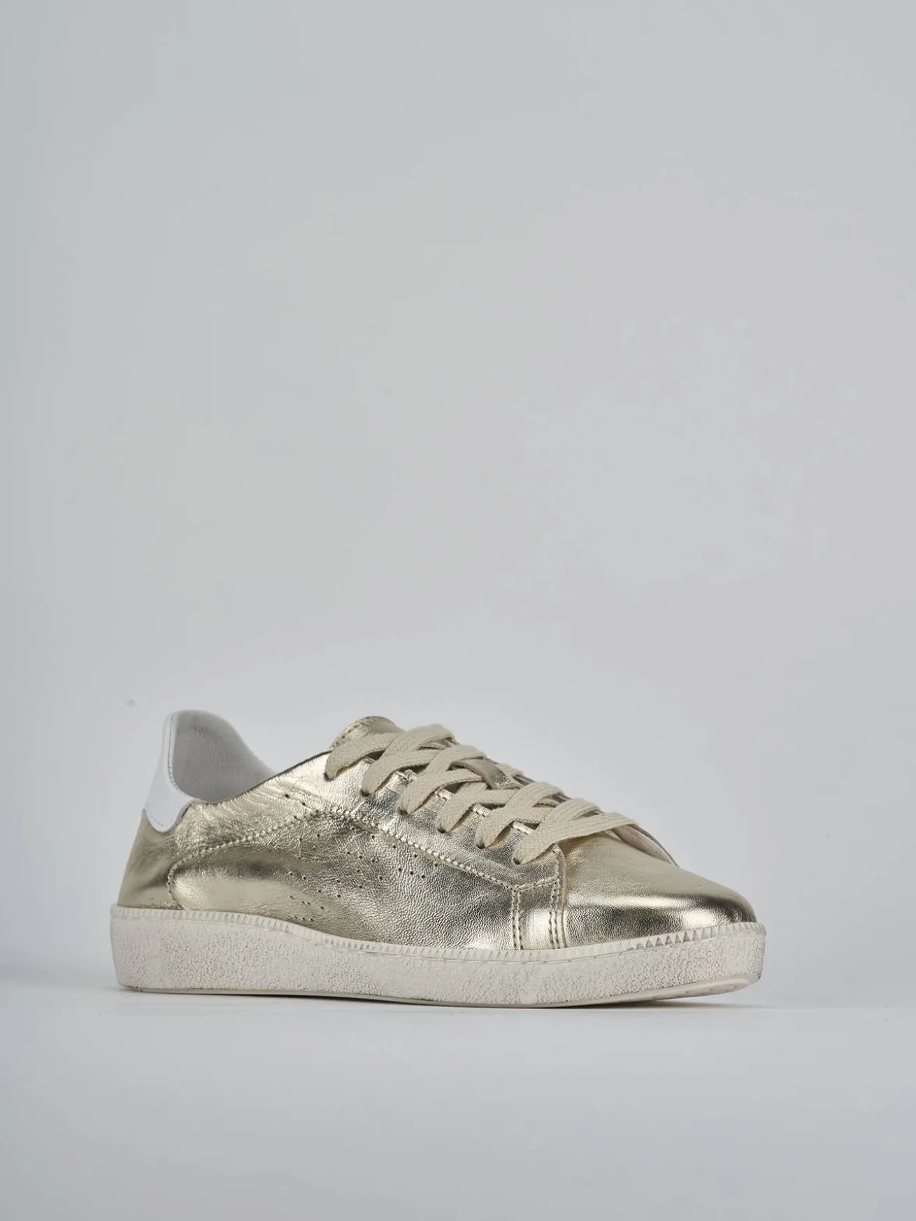 Sneakers laminato oro