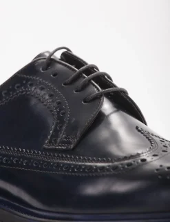 Stringata con fondo cuoio e soletto in vera pelle blu