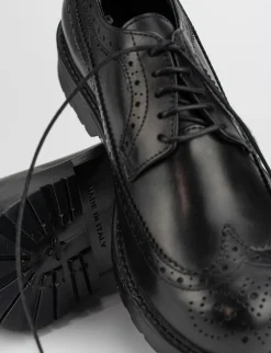 Stringata tacco 2 cm nero