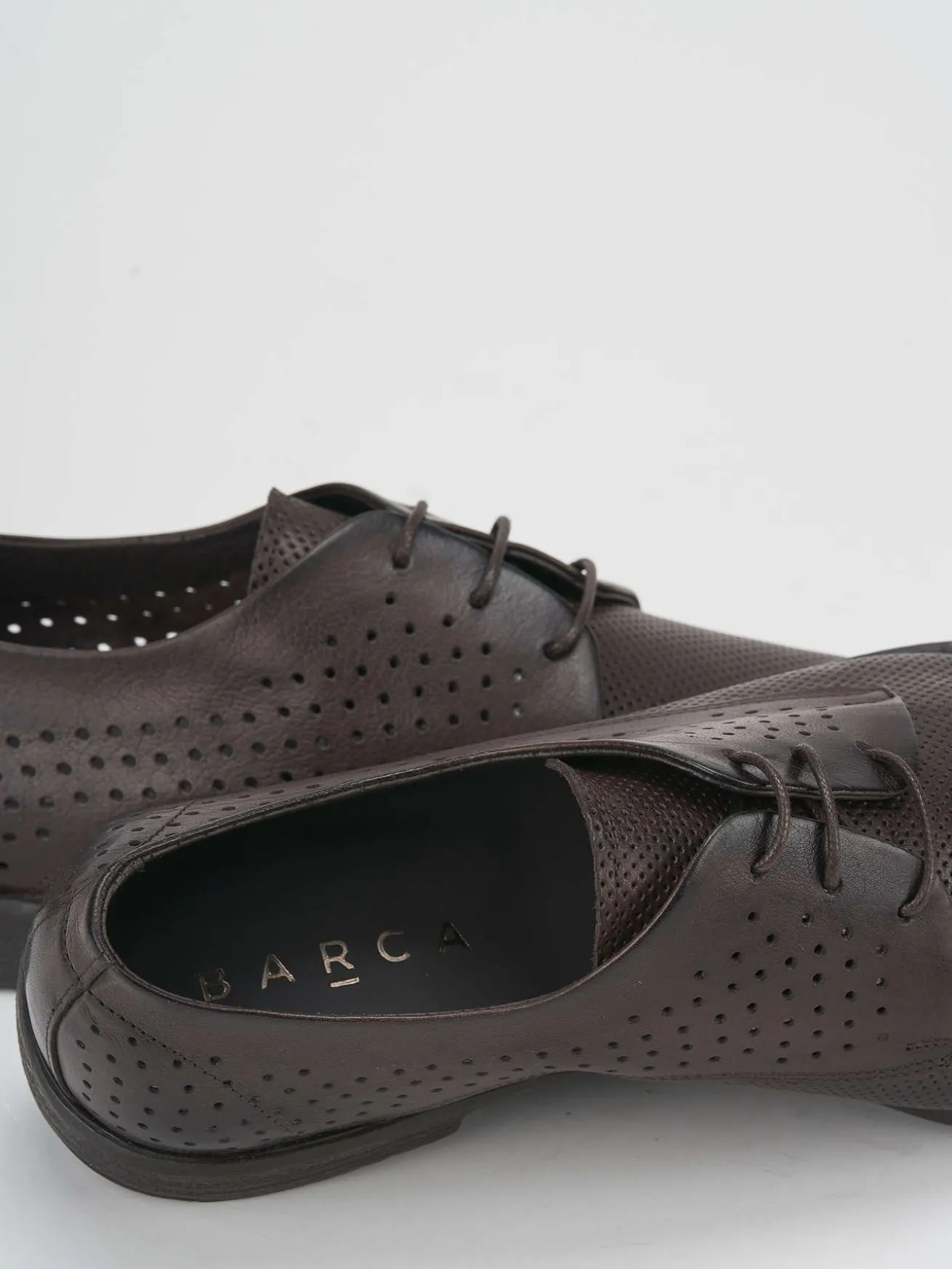 Stringata testa pelle