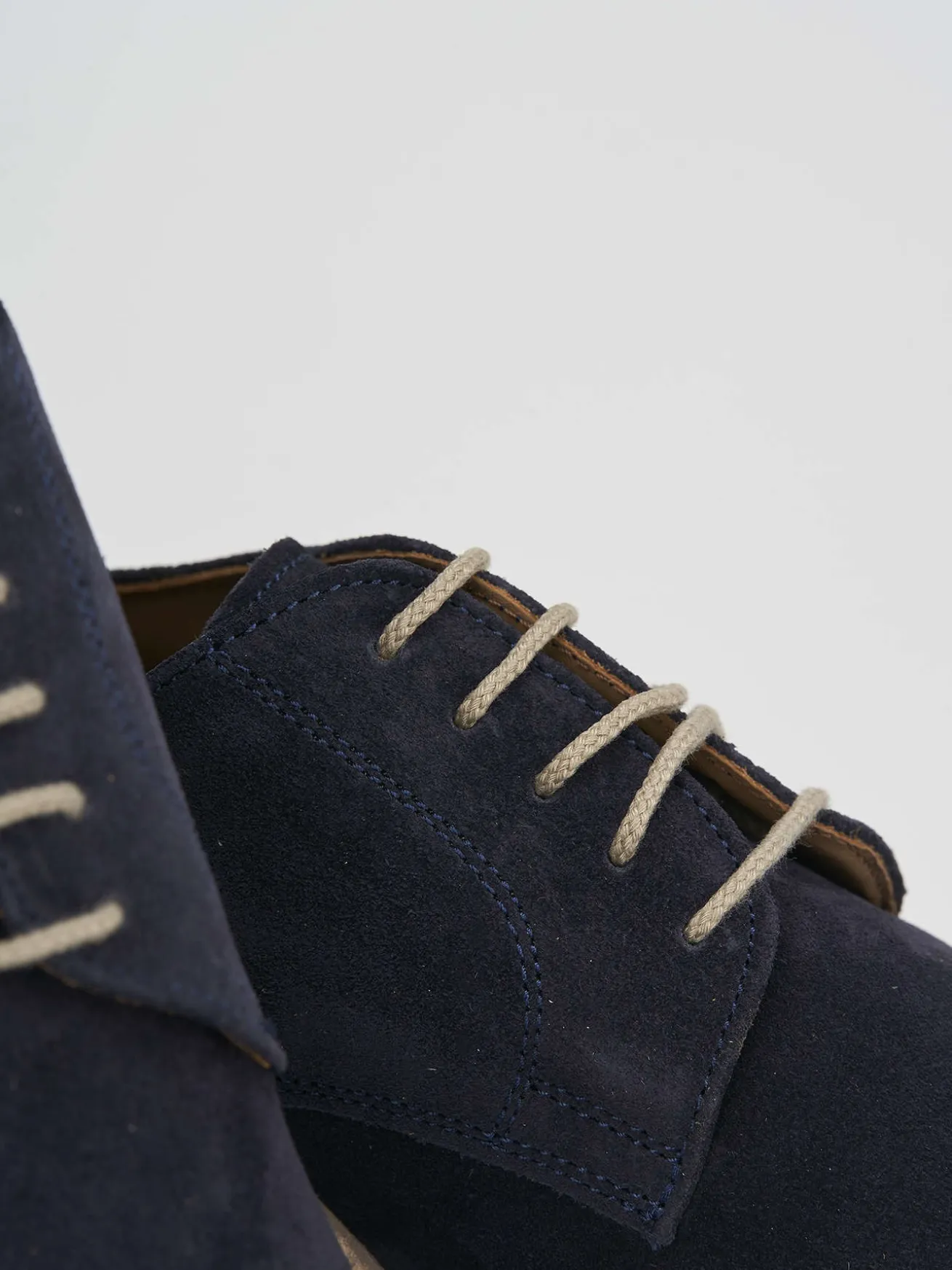 Stringate blu camoscio