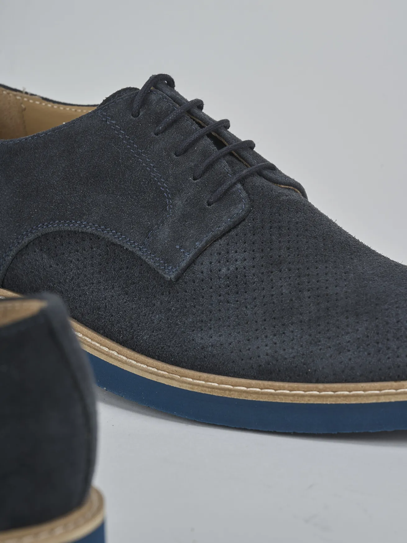 Stringate camoscio blu