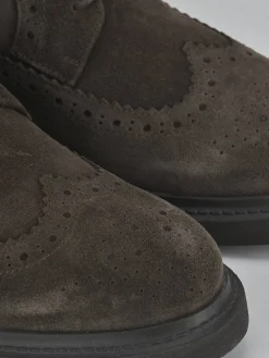 Stringate camoscio testa