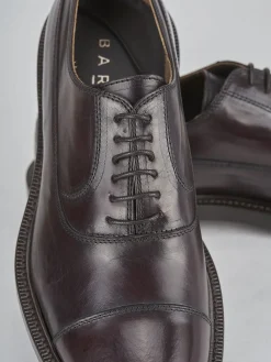 Stringate pelle bordo'