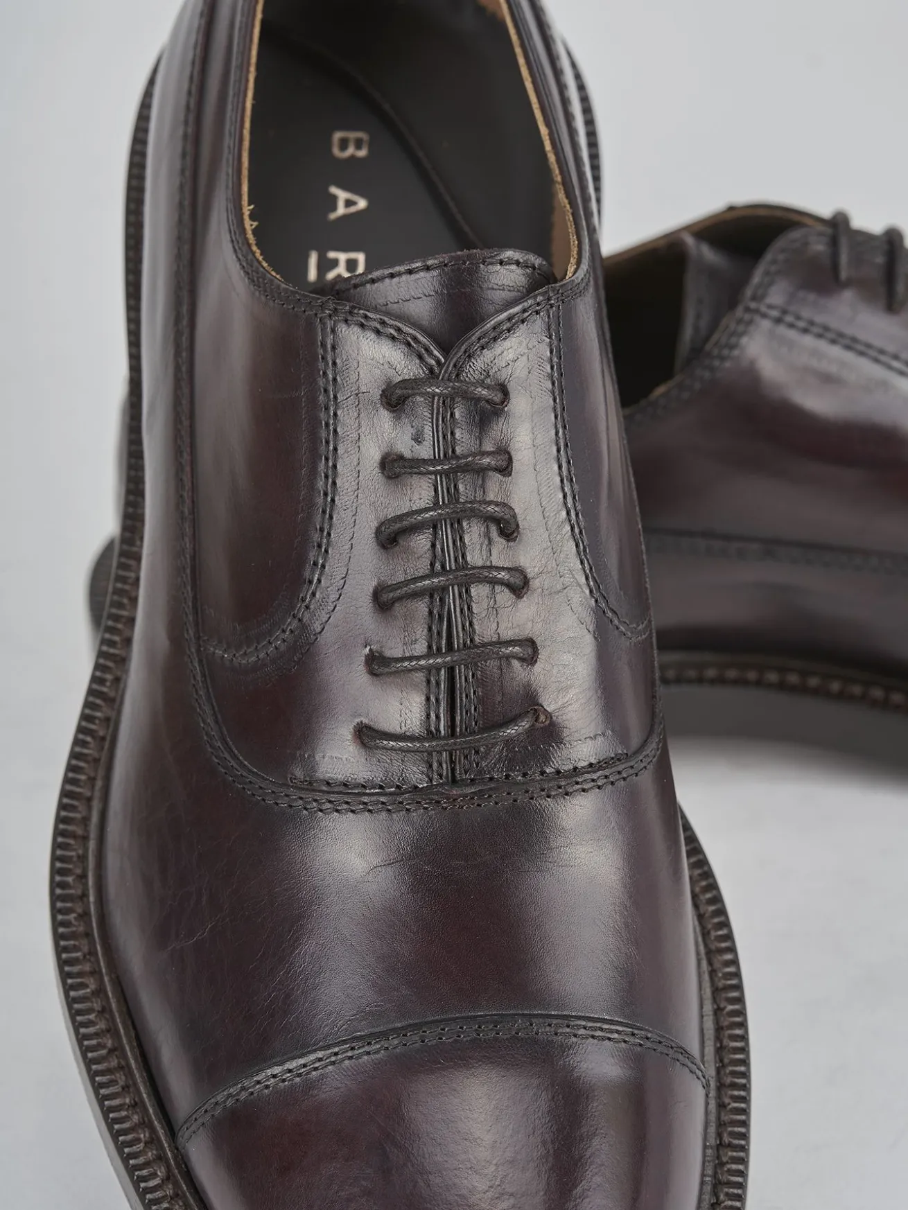 Stringate pelle bordo'