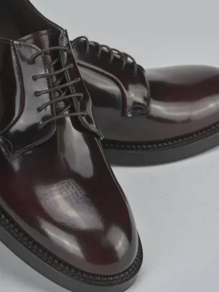 Stringate pelle bordo'