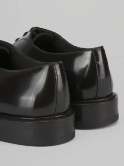 Stringate pelle testa