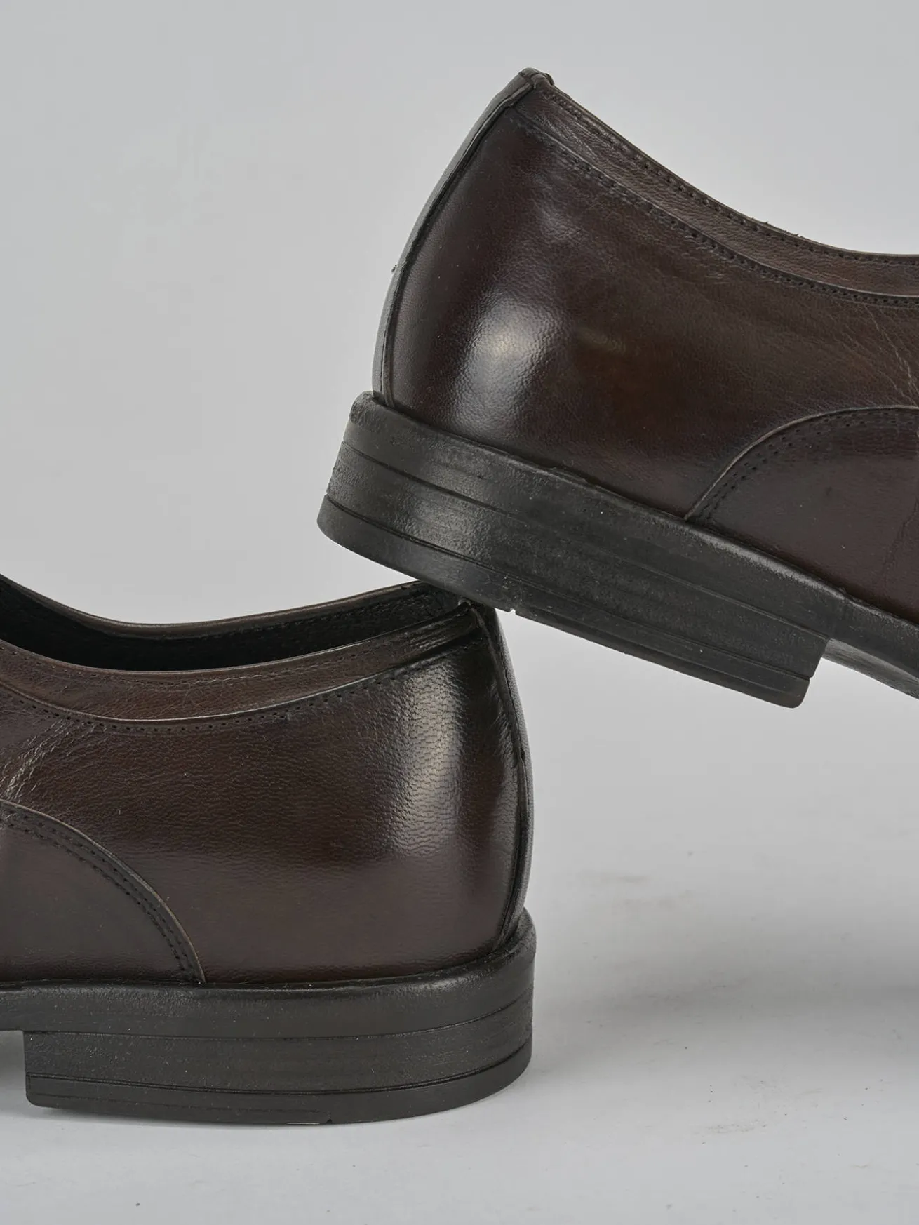 Stringate pelle testa