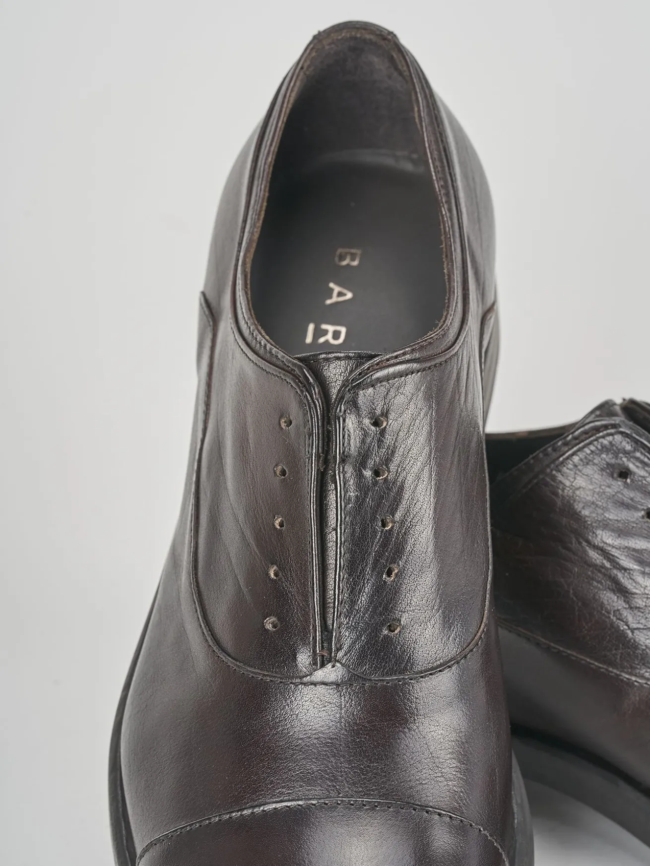 Stringate pelle testa