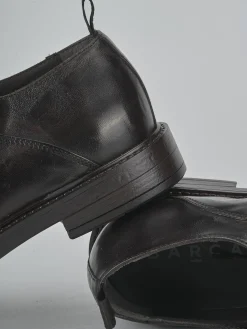 Stringate pelle testa