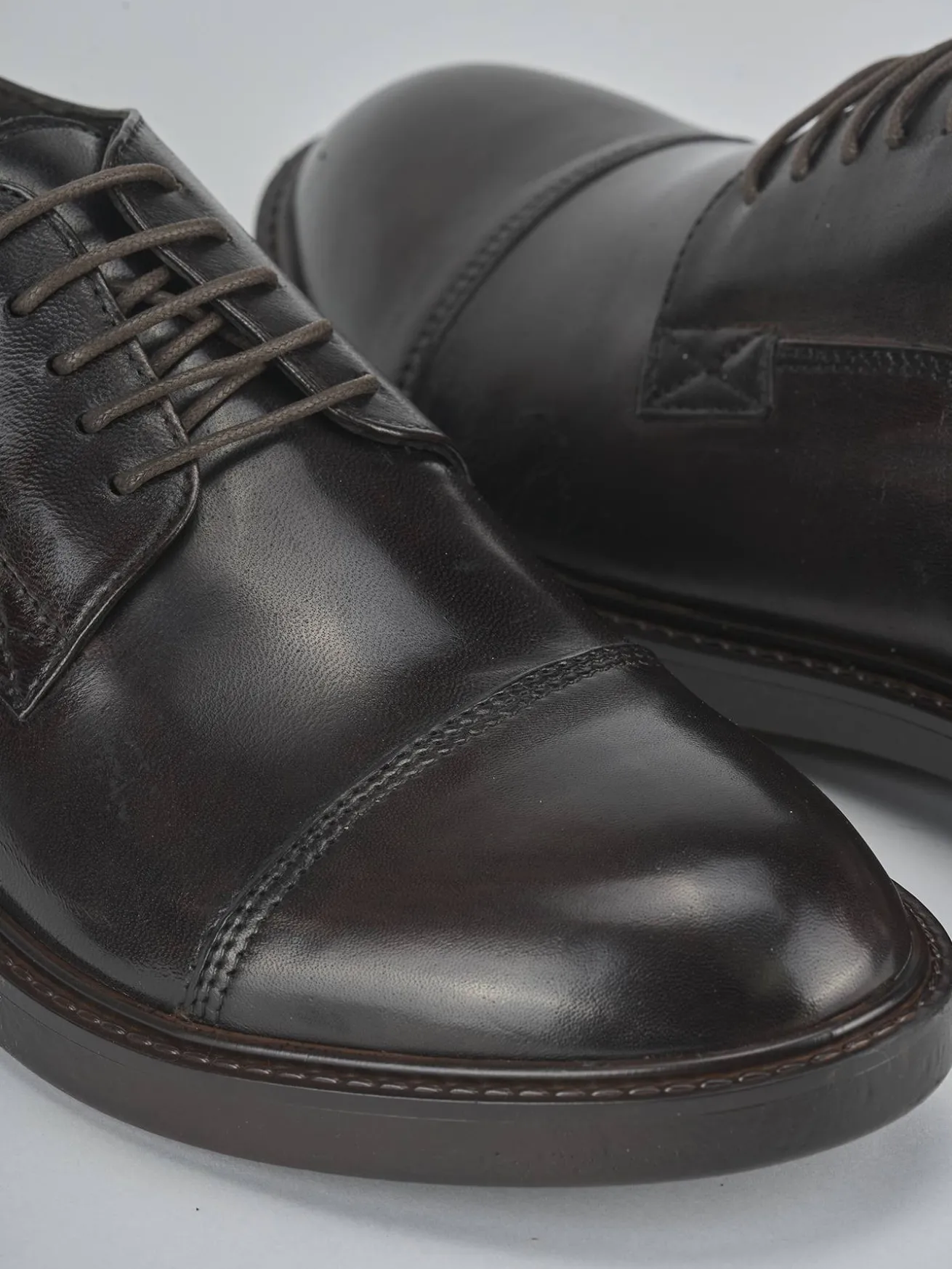 Stringate pelle testa