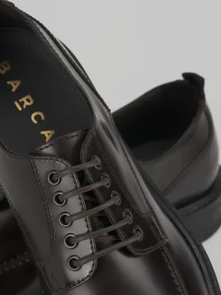 Stringate pelle testa