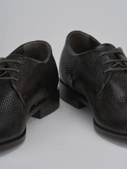 Stringate pelle testa