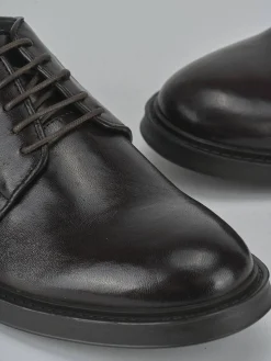 Stringate pelle testa