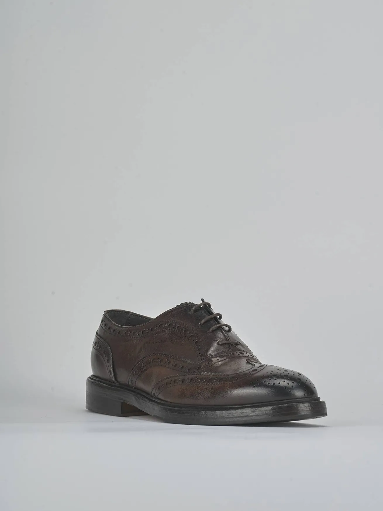 Stringate pelle testa