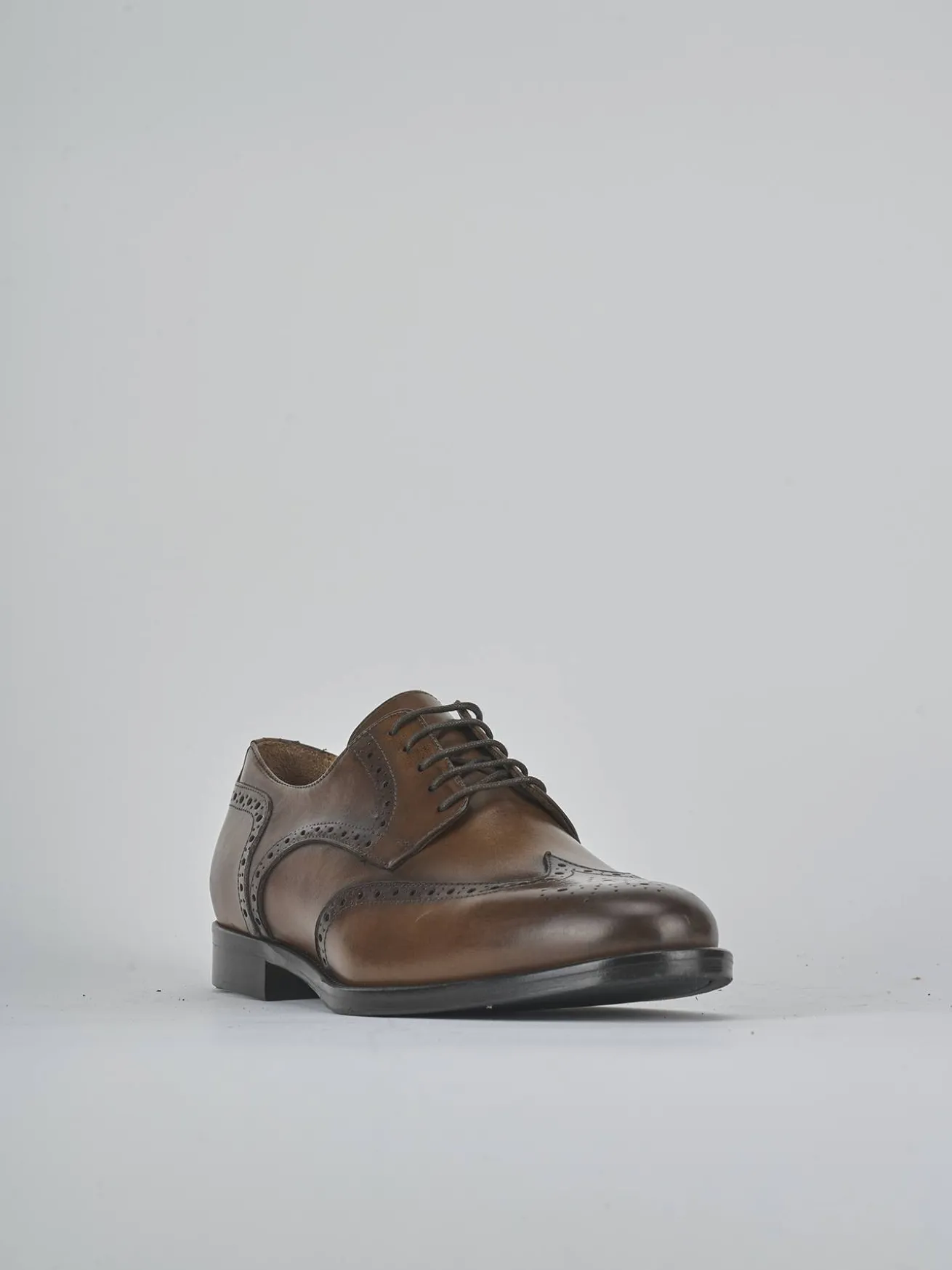 Stringate pelle testa