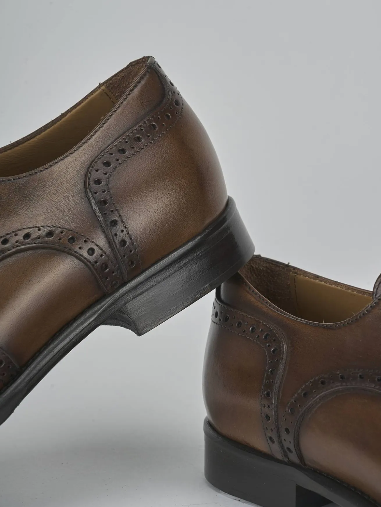 Stringate pelle testa