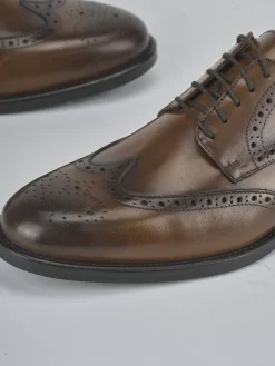 Stringate pelle testa