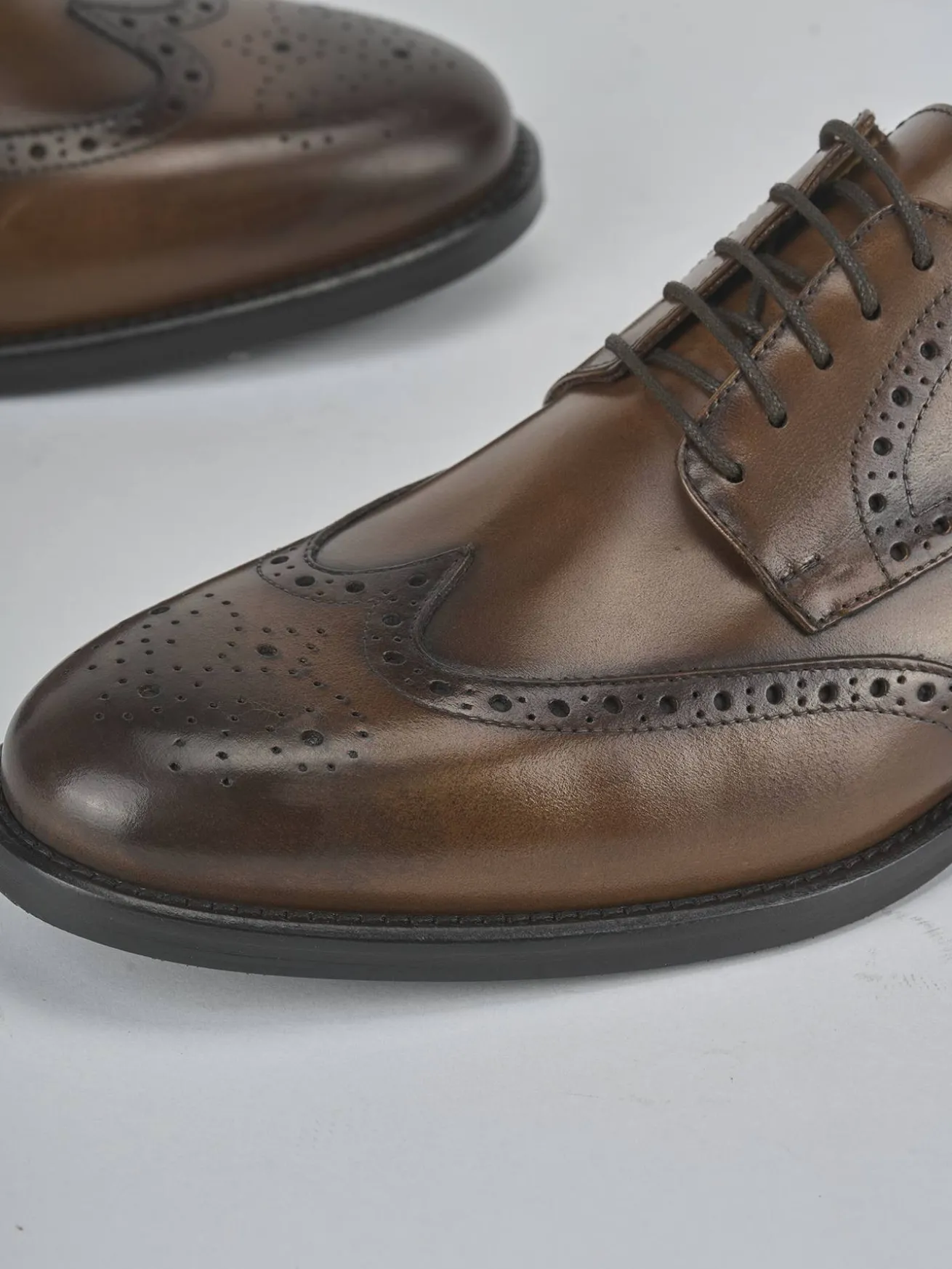 Stringate pelle testa