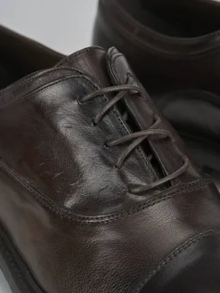 Stringate pelle testa