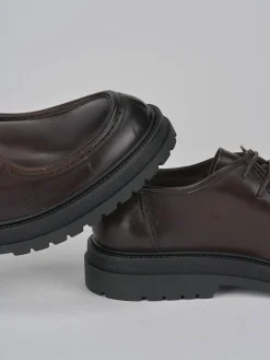 Stringate pelle testa